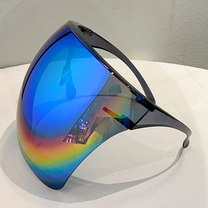 Side view of multi-color polarized protective goggles with iridescent lens and black frame