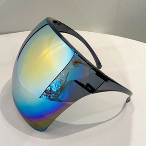 Close-up of full-face protective shield with iridescent coating and black frame