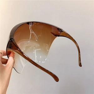 Protective gradient brown face shield with ergonomic nose pad and anti-fog polycarbonate lens