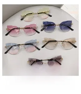 Lot de six lunettes de soleil œil de chat sans monture avec verres dégradés et dorés
