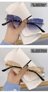 Détail de lunettes de soleil œil de chat sans monture avec cadre doré bleu et thé dégradé
