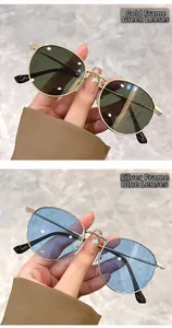 Detail of round sunglasses in gold frame green lens and silver frame blue lens