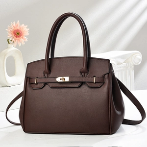 Sac à main classique en cuir grainé marron foncé avec fermoir doré et deux poignées