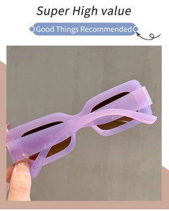 Detail view of stylish light purple rectangular sunglasses with thick frames and dark lenses