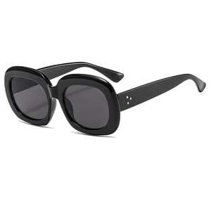 Lunettes de soleil ovales noires oversize avec rivets argentés et verres gris