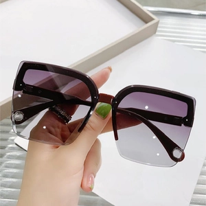 Fashion rimless oversized sunglasses with purple gradient lenses and hollow circle detail