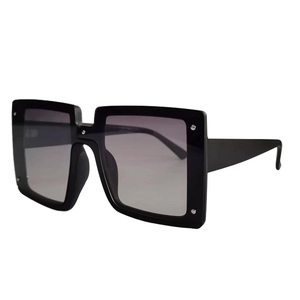Fashionable oversized square black sunglasses with silver studs and gradient lenses
