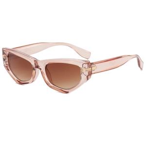 Fashionable cat eye sunglasses with transparent pink frames and brown gradient lenses