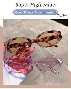 Detail of tortoise shell sunglasses and transparent pink oval frames in thick acetate
