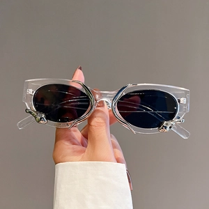 Y2K avant-garde sunglasses with transparent frames and silver claw metal accents