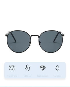 Detail of retro square ocean lens sunglasses featuring thin metal frames and sleek design