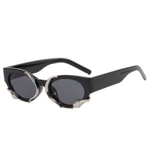 Retro cat-eye sunglasses with silver flame metal accents and dark grey lenses in black