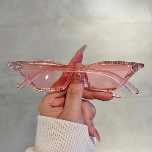 Fashionable pink cat eye sunglasses with rhinestone frame and matching pink lenses