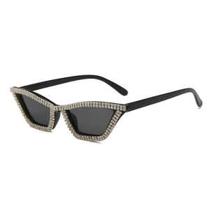 Cat eye sunglasses with black frame and full rhinestone inlay shown from 45-degree angle
