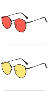 Close-up of retro square sunglasses with red and yellow lenses on black metal frames
