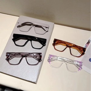 Cat-eye blue light blocking glasses in grey, black, brown, purple and clear frames