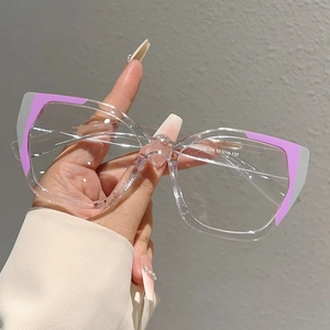 Detail of transparent cat-eye glasses with purple accents and temple size specifications