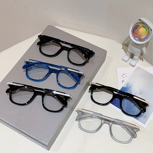 Detailed close-up of colorful cat eye frames with metal accents and sleek temples