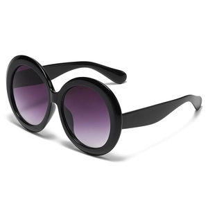 Fashion oversized round sunglasses with black frames and purple gradient lenses