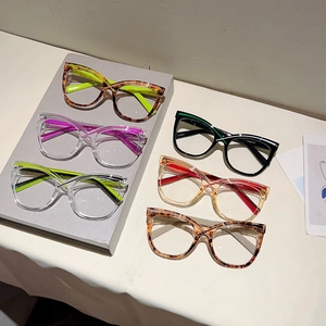 Detailed view of cat eye frame temples showing size 53-20-145 and color variations