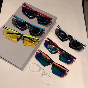 Multiple colorful sports sunglasses with streamline frames and gradient lenses for fishing