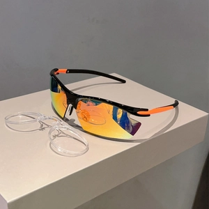 Detail of sports sunglasses featuring orange non-slip pads and built-in myopia inner frame