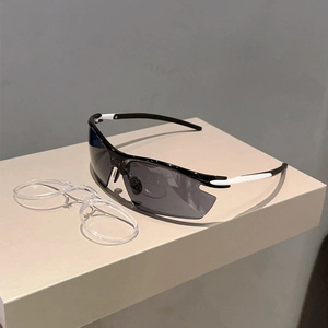 Detail of sports sunglasses with black and white frame and optical inner insert