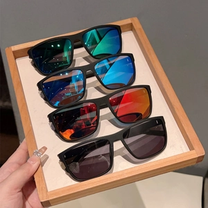 Classic square frame sunglasses with carbon fiber texture and multi-color lenses