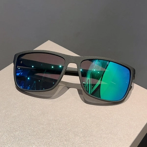 Detail of square sports sunglasses with matte black frame and green polarized mirror lenses