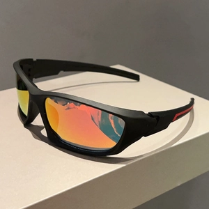 Fashionable sports sunglasses with black matte frames and red orange mirrored lenses
