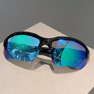 Detail of polarized sports sunglasses with blue-green mirrored lenses and black half-frame