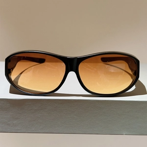 Lunettes de soleil de cyclisme unisexes avec monture noire et verres orange pour le sport