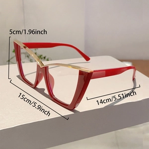 Detail view of red cat-eye glasses with gold trim and frame size specifications