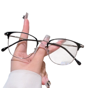 Modern half-frame glasses with black upper rim and silver metal legs for a stylish look
