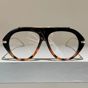 Retro pilot eyeglasses with black-brown gradient frames and gold metal bridge detail