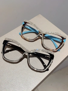Detail view of rhinestone cat-eye frame with model number W68092 and luxury crystal inlay