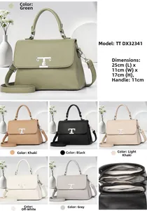 Detail view of large capacity leather handbag with multi-layer interior and metal buckle