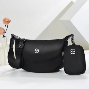Lightweight black nylon crossbody crescent bag with multi-compartments and mini pouch