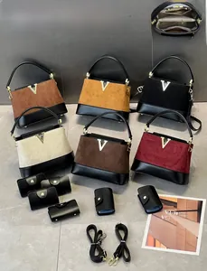 Detail view of stylish matte tote bags in six colors with mini pouch and strap