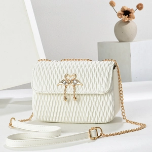 White quilted PU shoulder bag with golden swan heart clasp and pearl tassel detail