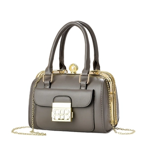 Elegant taupe leather handbag with interlocking B logo and pearl metal buckle detail