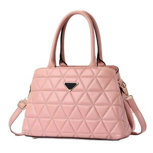 Elegant pink quilted leather handbag with twin handles and adjustable crossbody strap