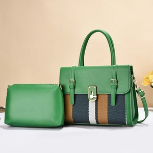 Grass green leather tote bag set with striped paneling and a matching pouch