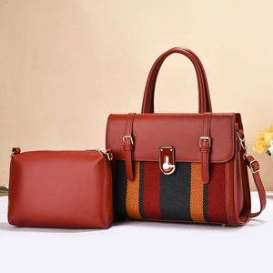 Premium red leather tote bag with striped detail and matching small zipper pouch set