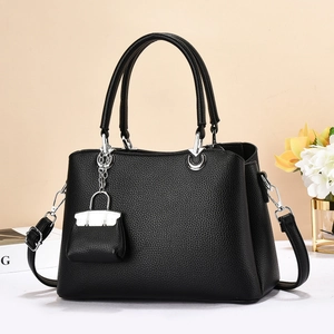 Large black litchi texture tote bag with top handles and adjustable shoulder strap