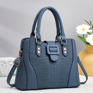Dunkelblaue Handtasche in Krokodilleder-Optik mit Griffen und verstellbarem Schultergurt