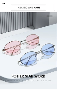 Gros plan sur des lunettes de soleil ovales rétro avec montures métalliques fines