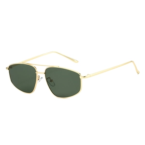 Classic gold metal aviator sunglasses with dark green lenses and a double bridge design