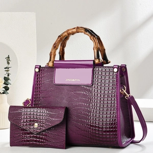 Purple crocodile pattern handbag set with bamboo handles and matching small wallet