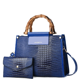 Navy blue crocodile pattern handbag set with bamboo handle and matching wallet